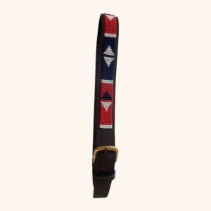 A brown leather belt with a brass buckle and a red, navy and white beaded panel with triangle patterns.