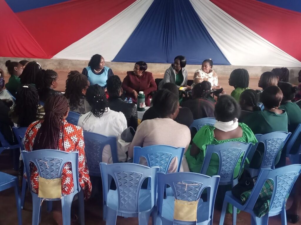 Women seated together in discussion at the Foundation women empowerment seminar.